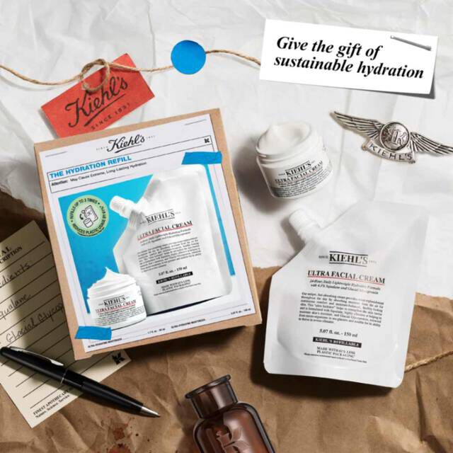 The Hydration Refill Gift Set on top of paper with elements scattered around​